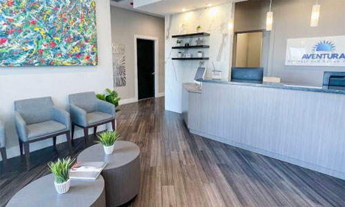 Aventura Wellness reception desk and patient seating area